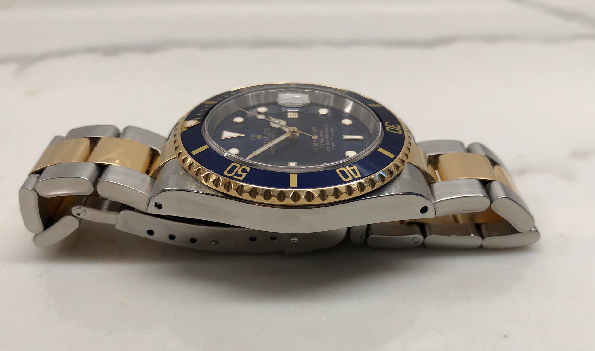 2001 Rolex Submariner 16613 Blue Two Tone Oyster Steel 18K Gold Wristwatch - HASHTAGWATCHCO