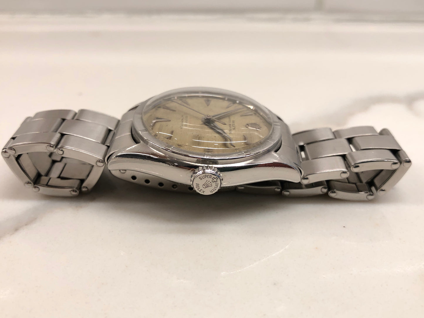 1953 Rolex Oyster Perpetual 6103 Stainless Steel Red OCC Chevron Dial Chronometer Automatic Wristwatch - HASHTAGWATCHCO
