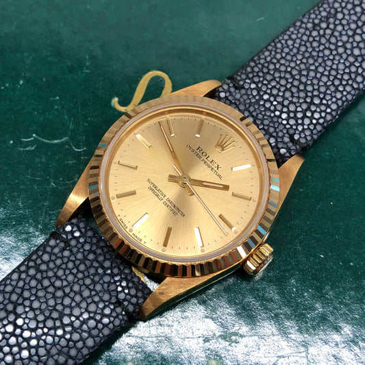 1989 Rolex Oyster Perpetual 67518 Champagne Dial 18K Yellow Gold Wristwatch - HASHTAGWATCHCO