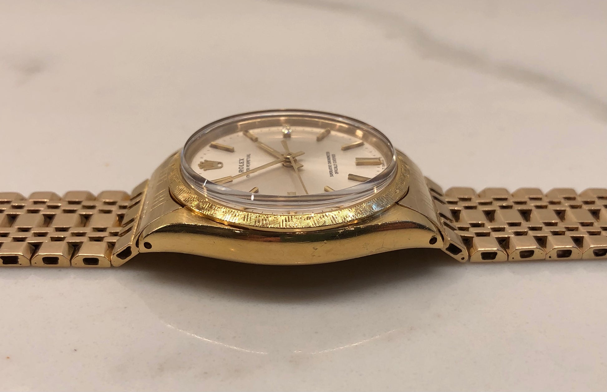 1973 Rolex Oyster Perpetual 1035 18K Yellow Gold Florentine Bezel Automatic Wristwatch - HASHTAGWATCHCO