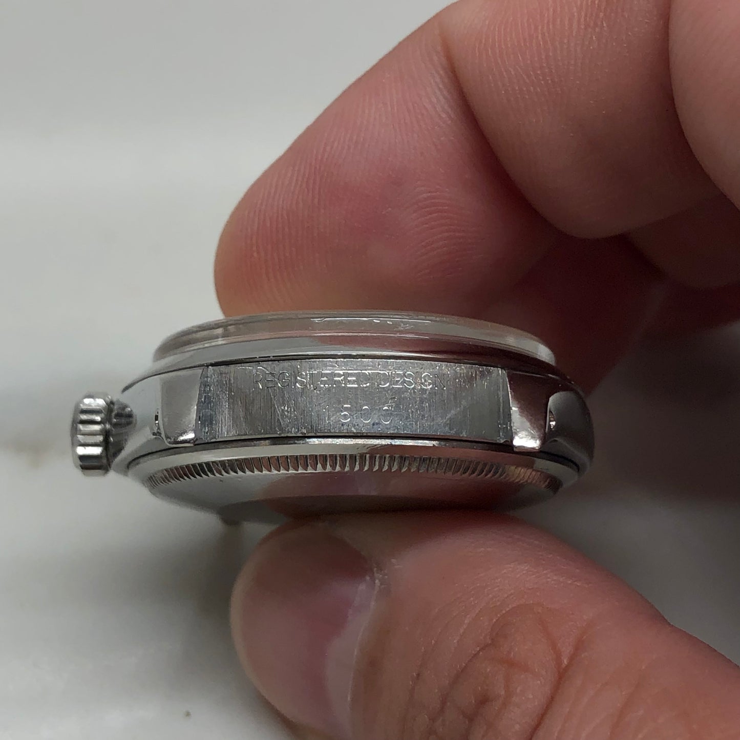 1976 Rolex Date 1500 Oyster Perpetual White Roman Steel Automatic Wristwatch - HASHTAGWATCHCO
