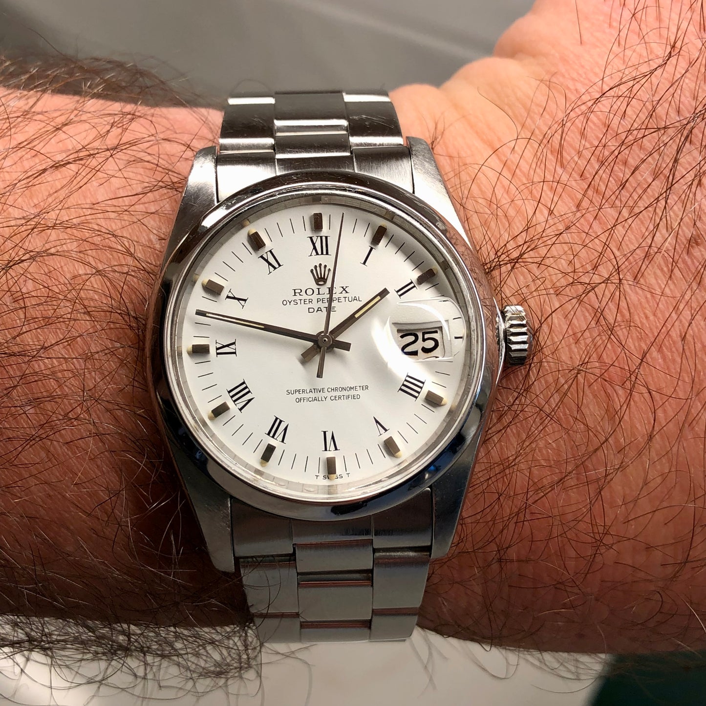 1976 Rolex Date 1500 Oyster Perpetual White Roman Steel Automatic Wristwatch - HASHTAGWATCHCO