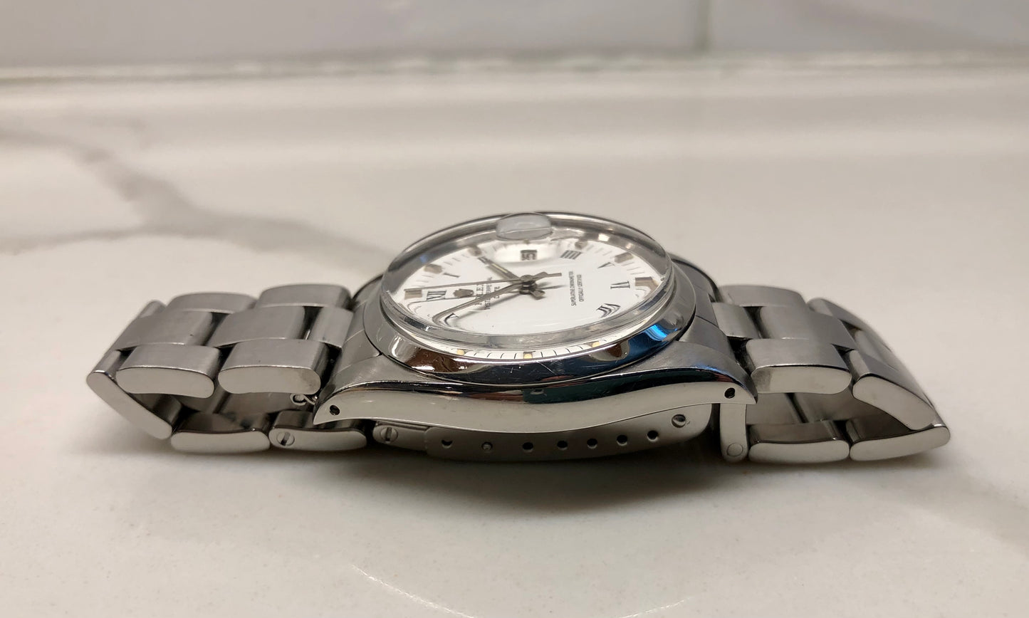 1976 Rolex Date 1500 Oyster Perpetual White Roman Steel Automatic Wristwatch - HASHTAGWATCHCO