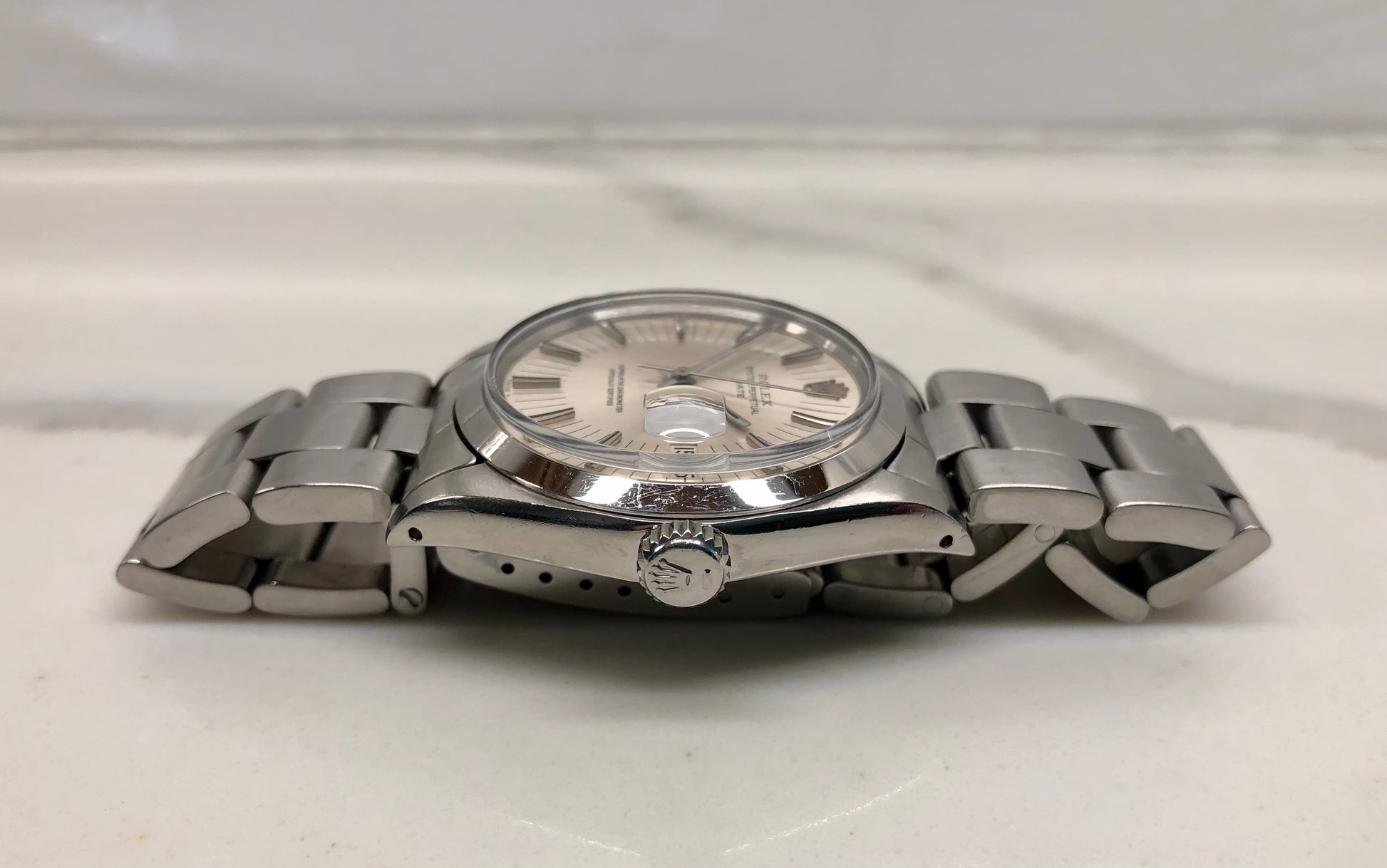 1971 Rolex Date 1500 Oyster Perpetual Silver Radial Dial Steel Automatic Wristwatch - HASHTAGWATCHCO