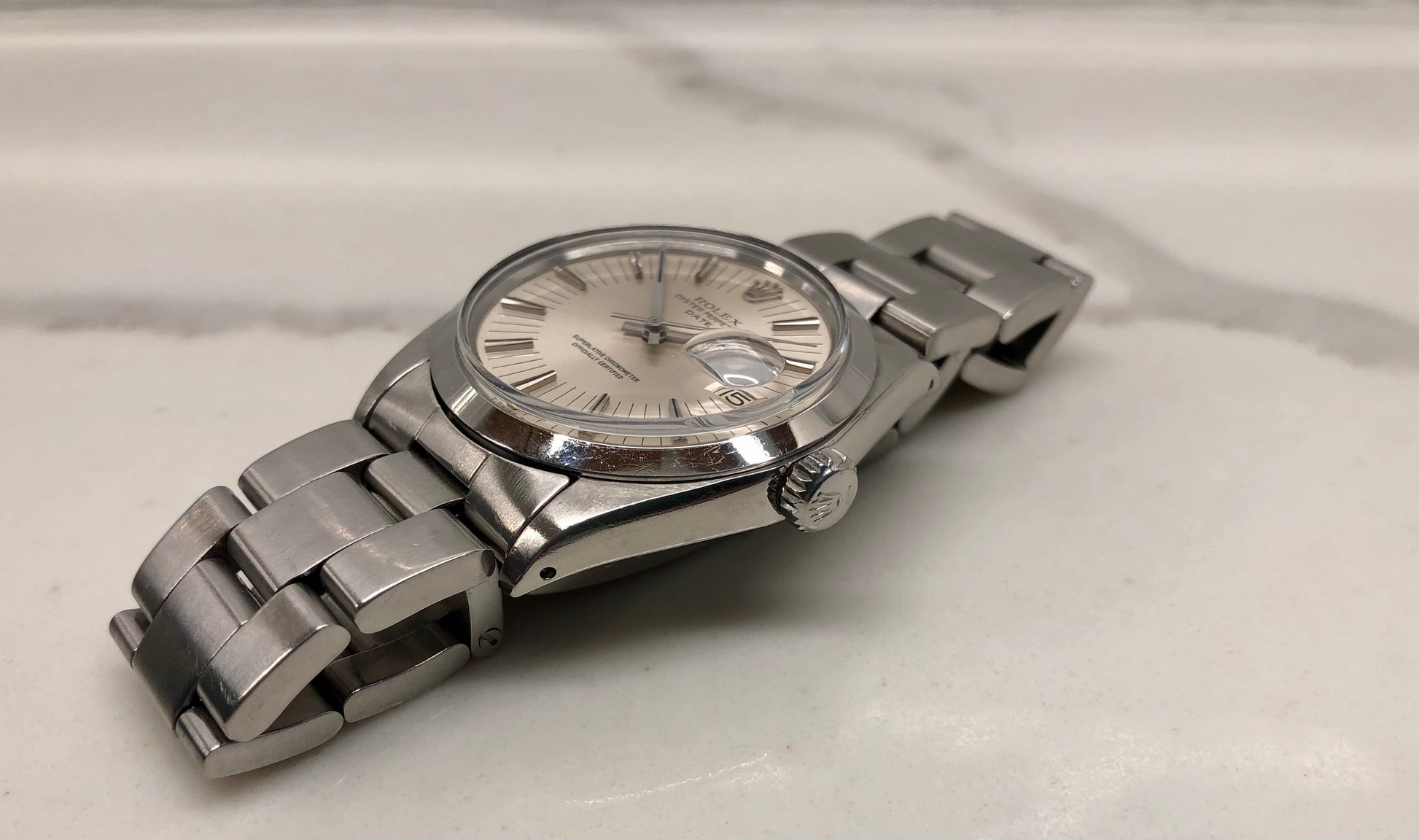 1971 Rolex Date 1500 Oyster Perpetual Silver Radial Dial Steel Automatic Wristwatch - HASHTAGWATCHCO