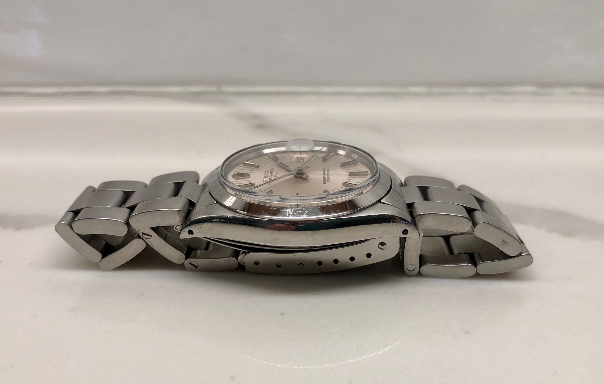 1971 Rolex Date 1500 Oyster Perpetual Silver Radial Dial Steel Automatic Wristwatch - HASHTAGWATCHCO