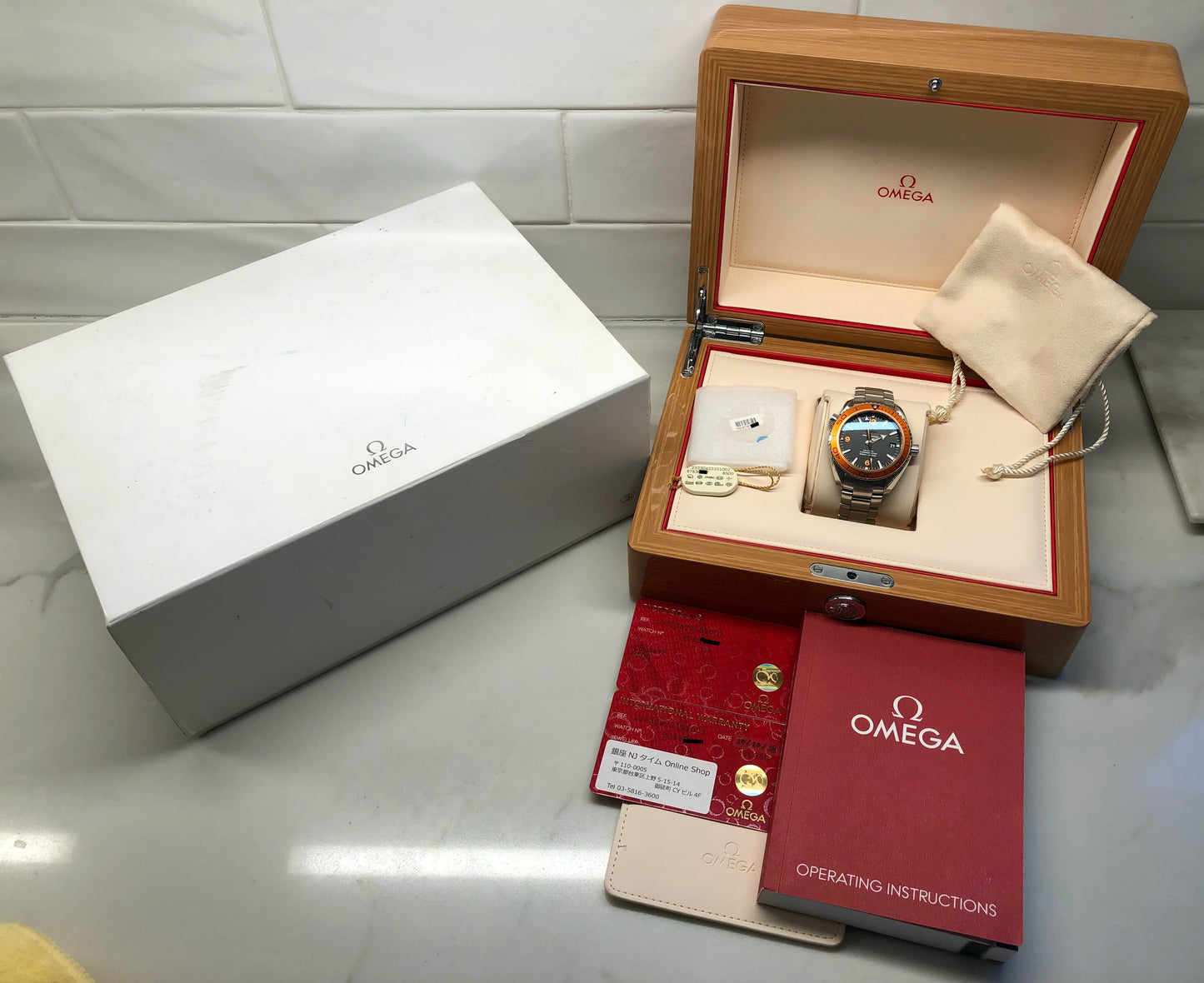 2018 Omega Planet Ocean 600M Seamaster 232.30.42.21.01.002 Steel Co-Axial 42mm Orange Bezel Box Papers - Hashtag Watch Co.