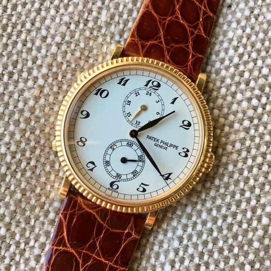Patek Philippe Calatrava Travel Time 5034J Manual Yellow Gold Mens Watch - Hashtag Watch Company