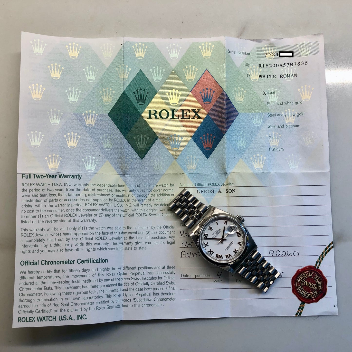 2005 Rolex Datejust 16200 White Roman Dial Jubilee Wristwatch with Papers - Hashtag Watch Company