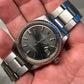 1970 Rolex Datejust 1603 Grey Dial Engine Turned Oyster Automatic Wristwatch