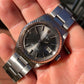 1970 Rolex Datejust 1603 Grey Dial Engine Turned Oyster Automatic Wristwatch