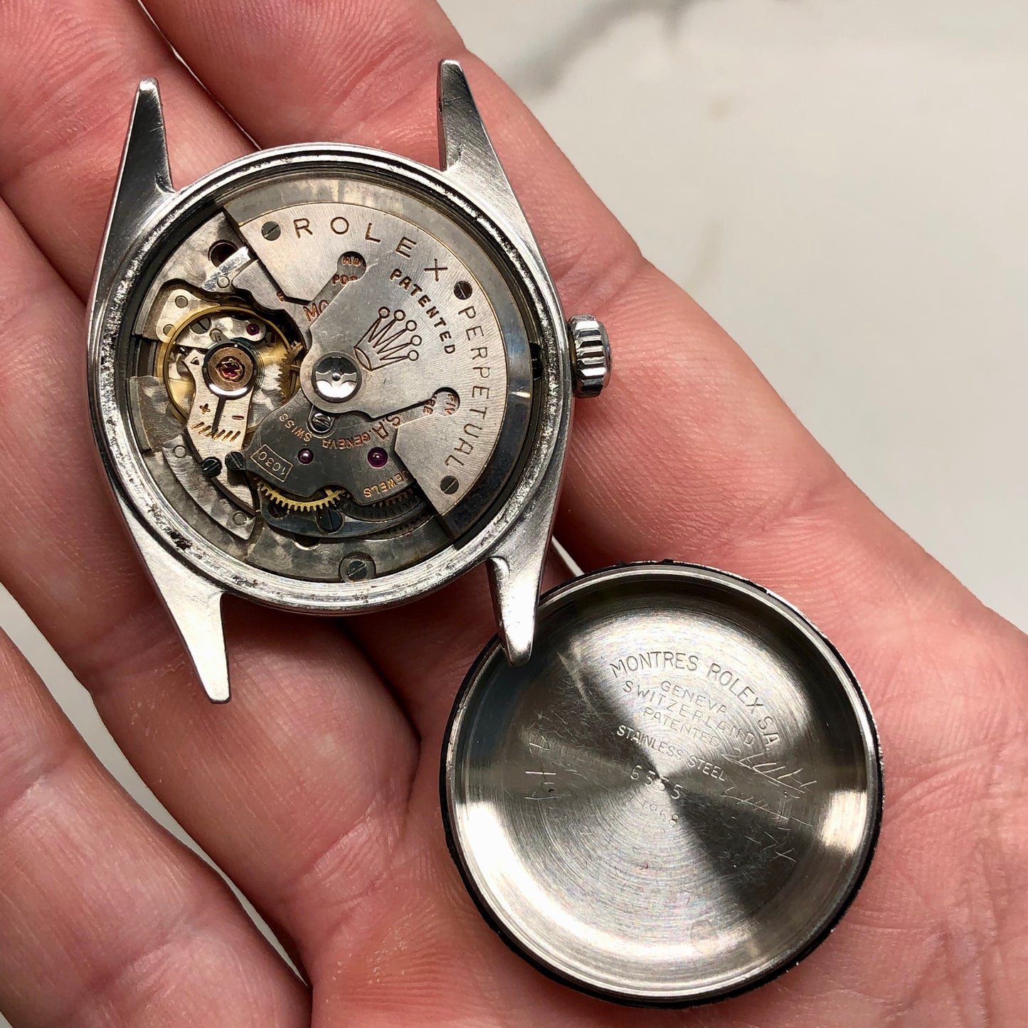 1958 Rolex Date 6535 Steel Engine Turned Oyster Roulette Wheel Automatic Wristwatch