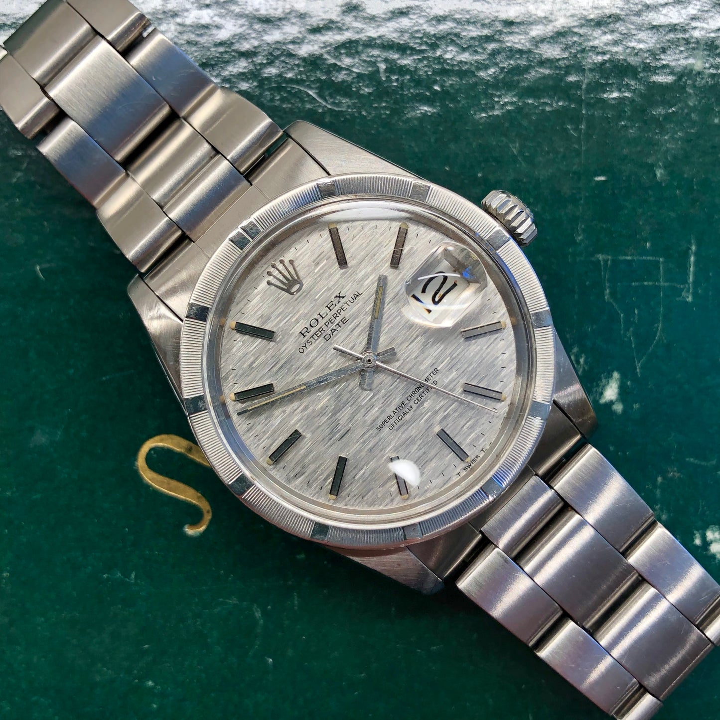 1975 Rolex Date 1501 Steel Engine Turned Oyster Silver Mosaic Dial Wristwatch