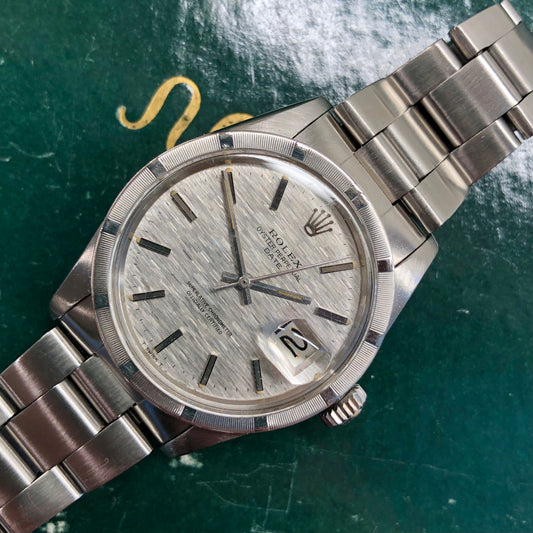 1975 Rolex Date 1501 Steel Engine Turned Oyster Silver Mosaic Dial Wristwatch