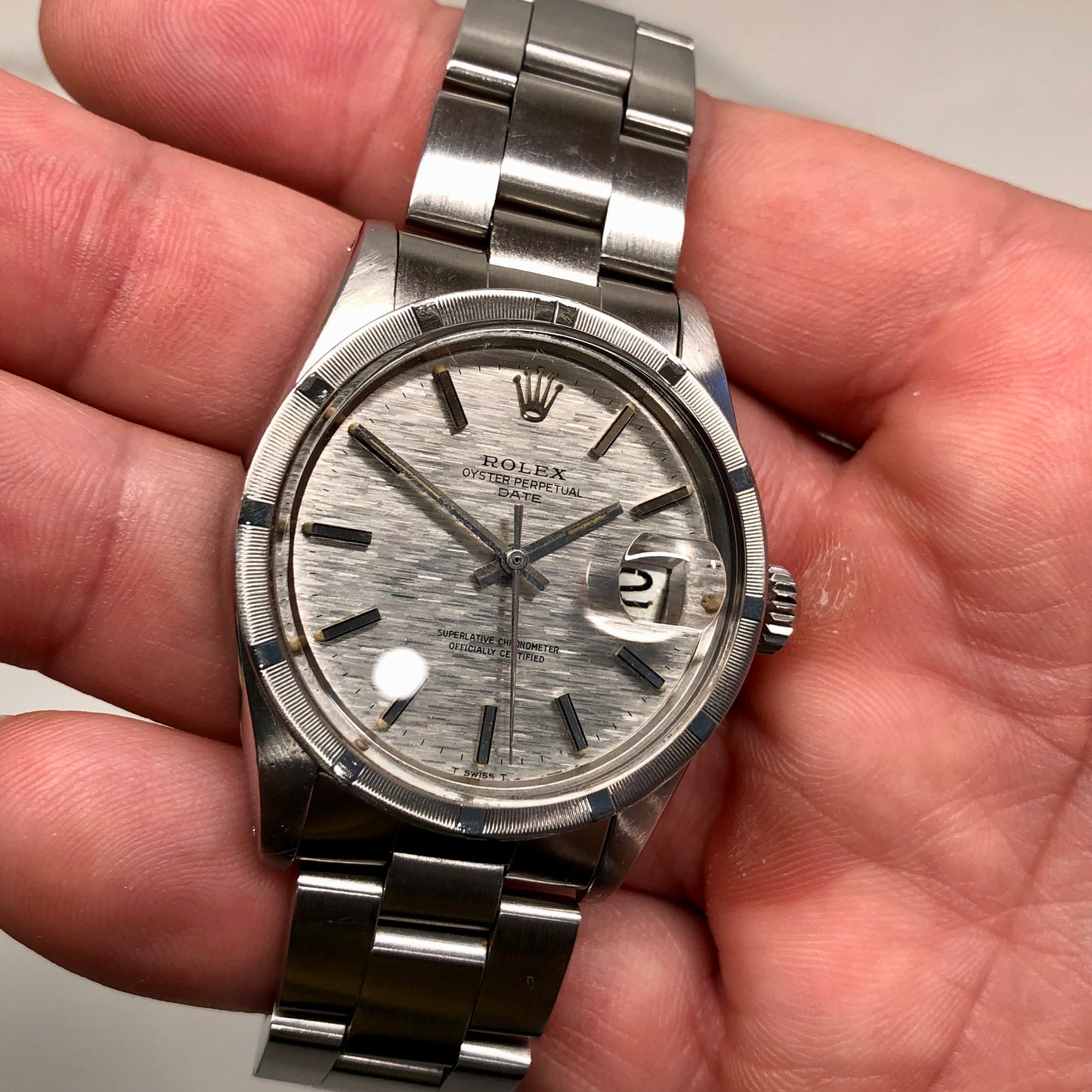 1975 Rolex Date 1501 Steel Engine Turned Oyster Silver Mosaic Dial Wristwatch