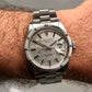 1975 Rolex Date 1501 Steel Engine Turned Oyster Silver Mosaic Dial Wristwatch