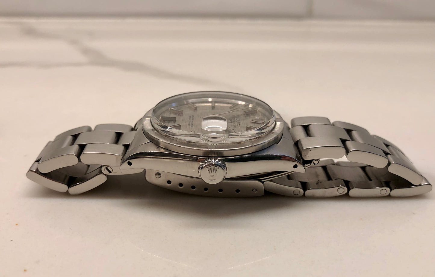 1975 Rolex Date 1501 Steel Engine Turned Oyster Silver Mosaic Dial Wristwatch