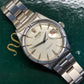 1958 Rolex Date 6535 Steel Engine Turned Oyster Roulette Wheel Automatic Wristwatch