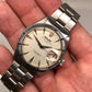 1958 Rolex Date 6535 Steel Engine Turned Oyster Roulette Wheel Automatic Wristwatch