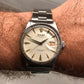 1958 Rolex Date 6535 Steel Engine Turned Oyster Roulette Wheel Automatic Wristwatch