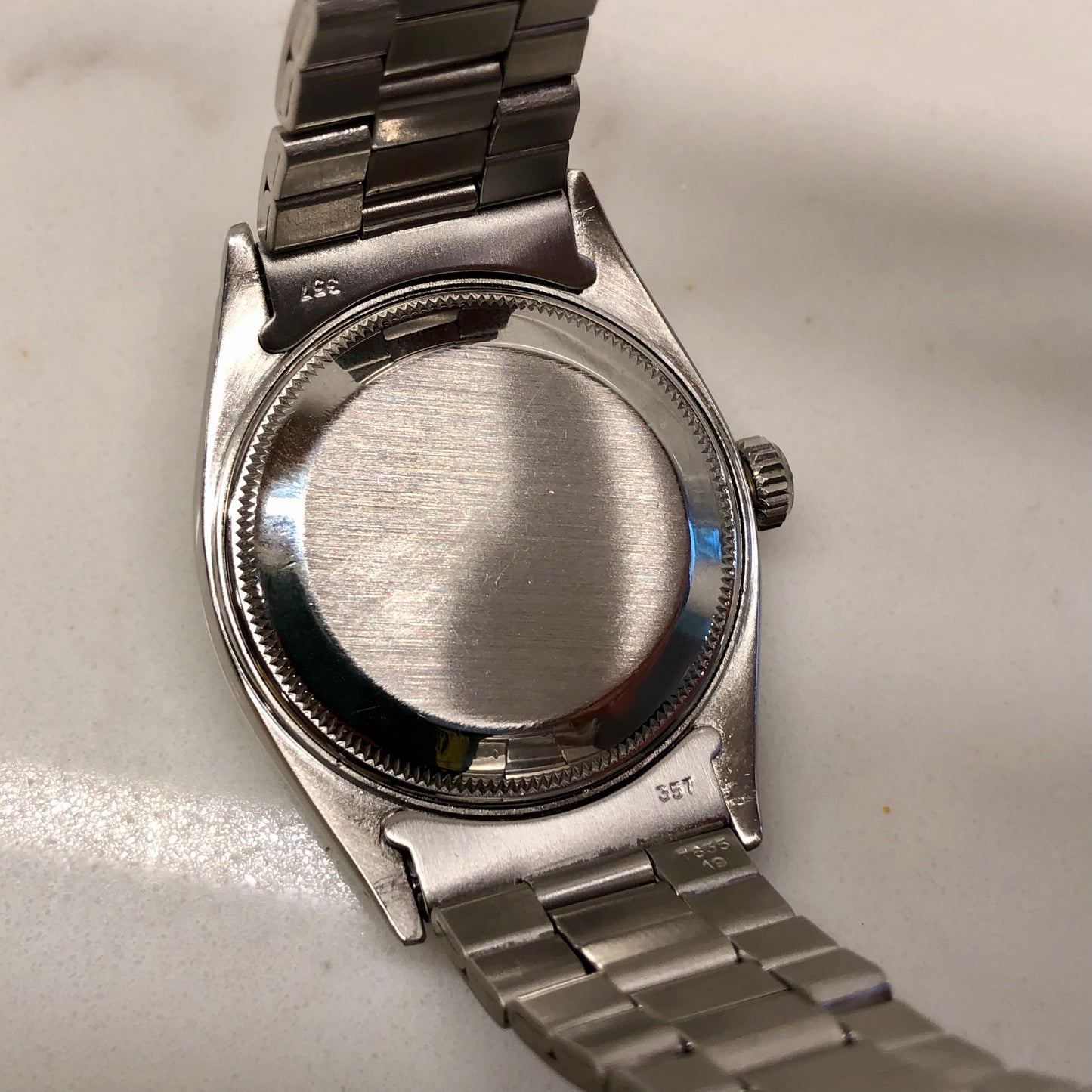 1958 Rolex Date 6535 Steel Engine Turned Oyster Roulette Wheel Automatic Wristwatch