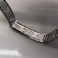 1958 Rolex Date 6535 Steel Engine Turned Oyster Roulette Wheel Automatic Wristwatch