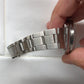1958 Rolex Date 6535 Steel Engine Turned Oyster Roulette Wheel Automatic Wristwatch