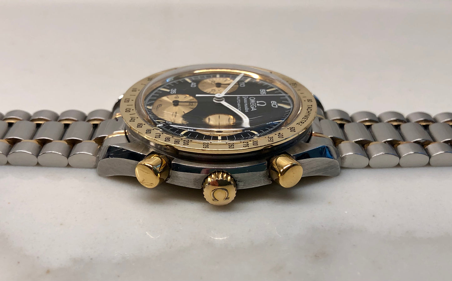 1990s Omega Speedmaster Reduced 175.00.33 Chronograph Steel and Gold Automatic Wristwatch - HASHTAGWATCHCO