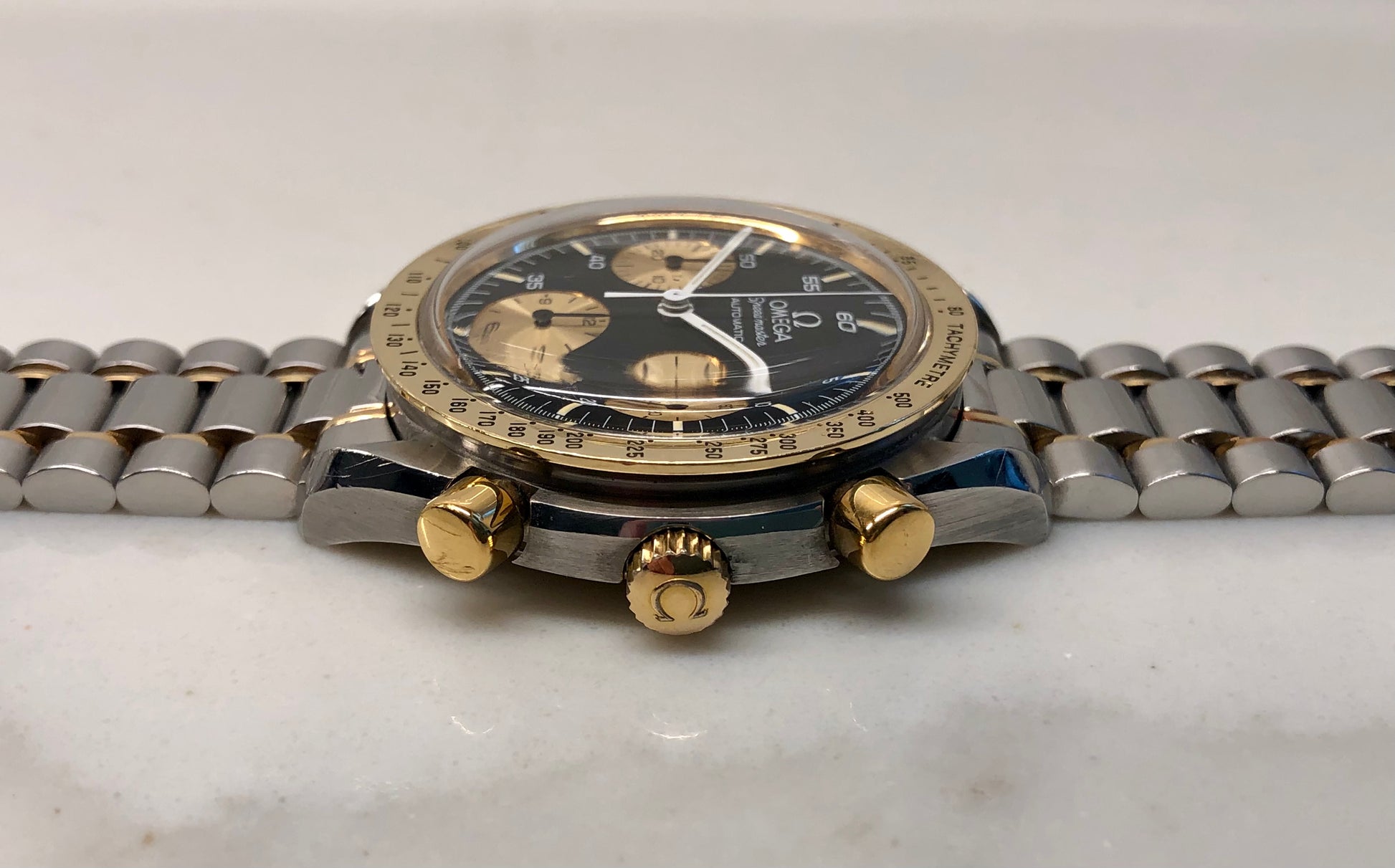 1990s Omega Speedmaster Reduced 175.00.33 Chronograph Steel and Gold Automatic Wristwatch - HASHTAGWATCHCO