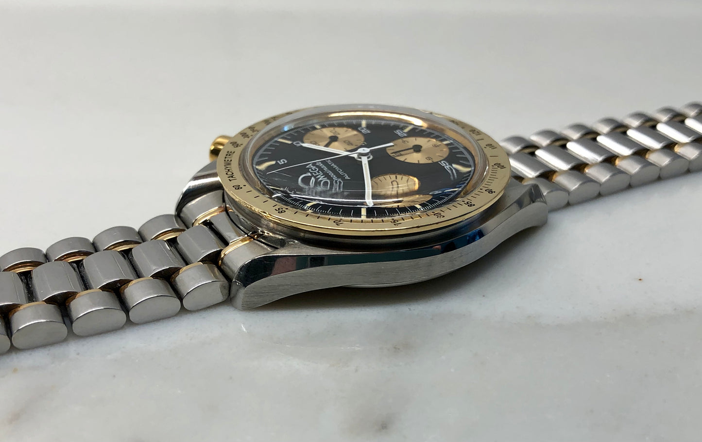 1990s Omega Speedmaster Reduced 175.00.33 Chronograph Steel and Gold Automatic Wristwatch - HASHTAGWATCHCO
