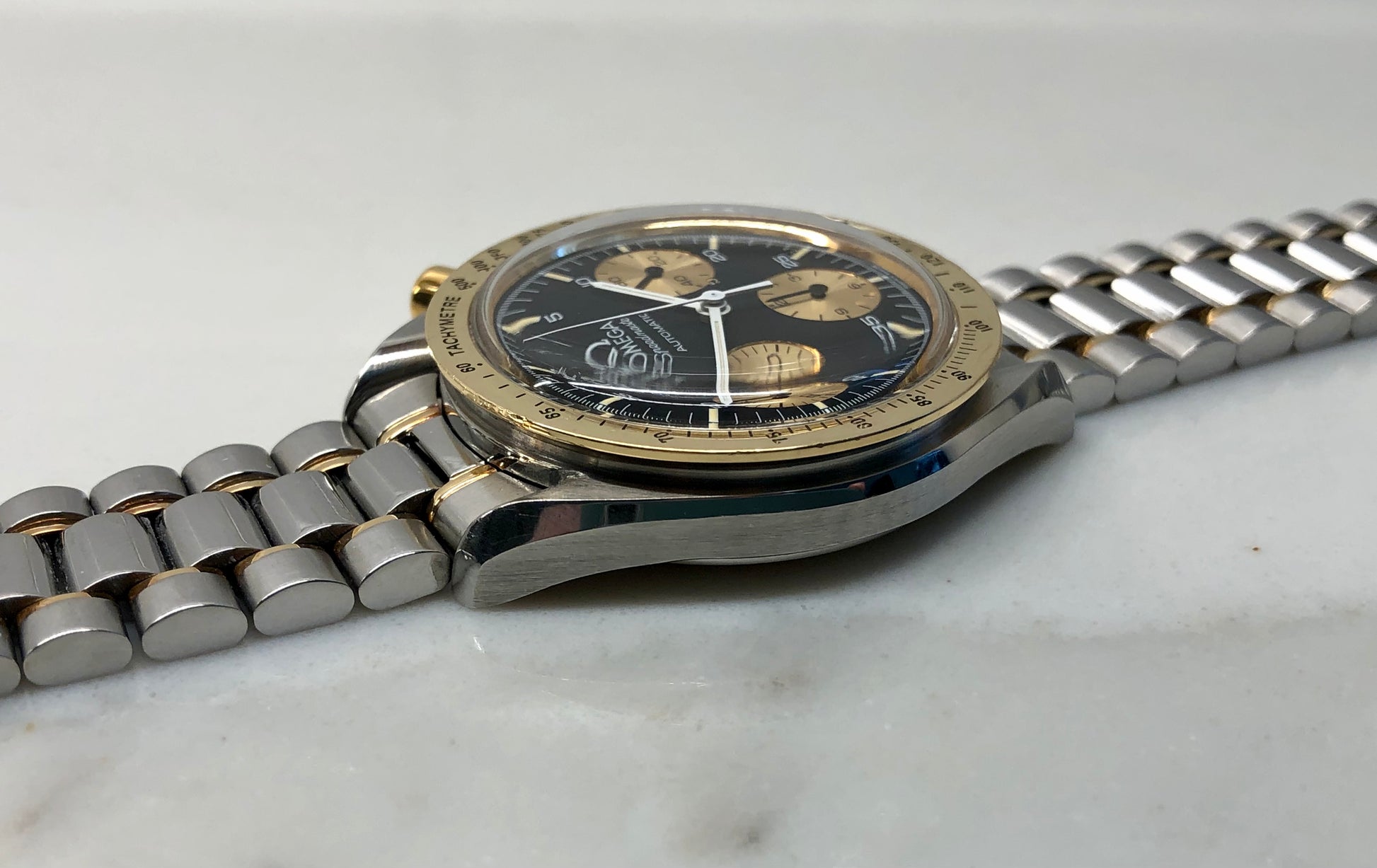1990s Omega Speedmaster Reduced 175.00.33 Chronograph Steel and Gold Automatic Wristwatch - HASHTAGWATCHCO