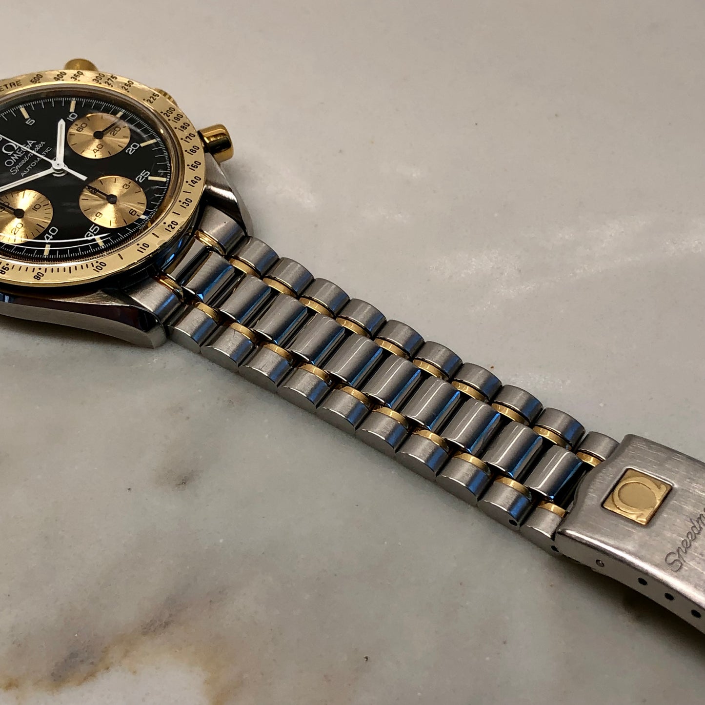 1990s Omega Speedmaster Reduced 175.00.33 Chronograph Steel and Gold Automatic Wristwatch - HASHTAGWATCHCO