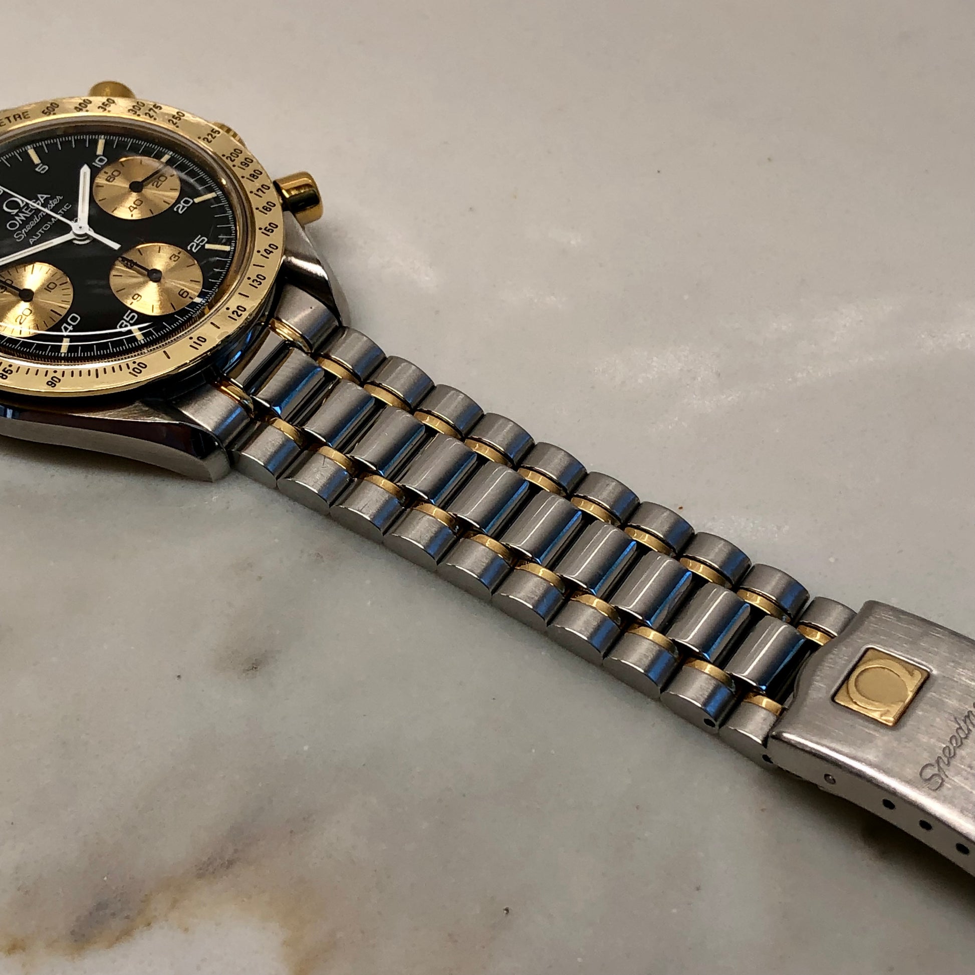 1990s Omega Speedmaster Reduced 175.00.33 Chronograph Steel and Gold Automatic Wristwatch - HASHTAGWATCHCO