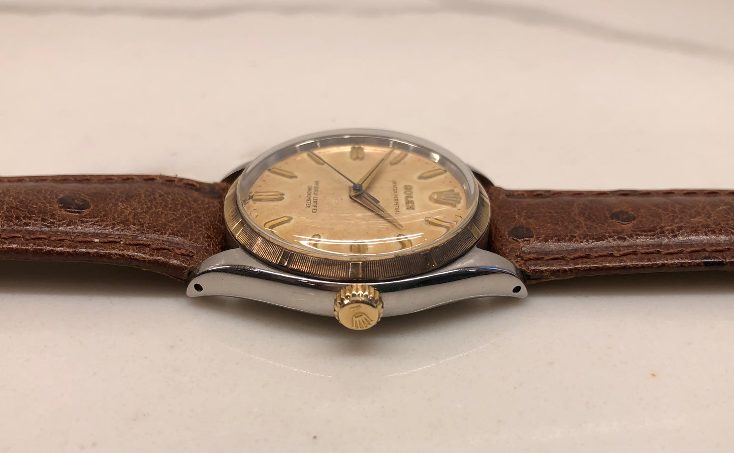 1957 Rolex Oyster Perpetual 6565 Two Tone Engine Turned Bezel Automatic Wristwatch