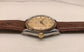 1957 Rolex Oyster Perpetual 6565 Two Tone Engine Turned Bezel Automatic Wristwatch