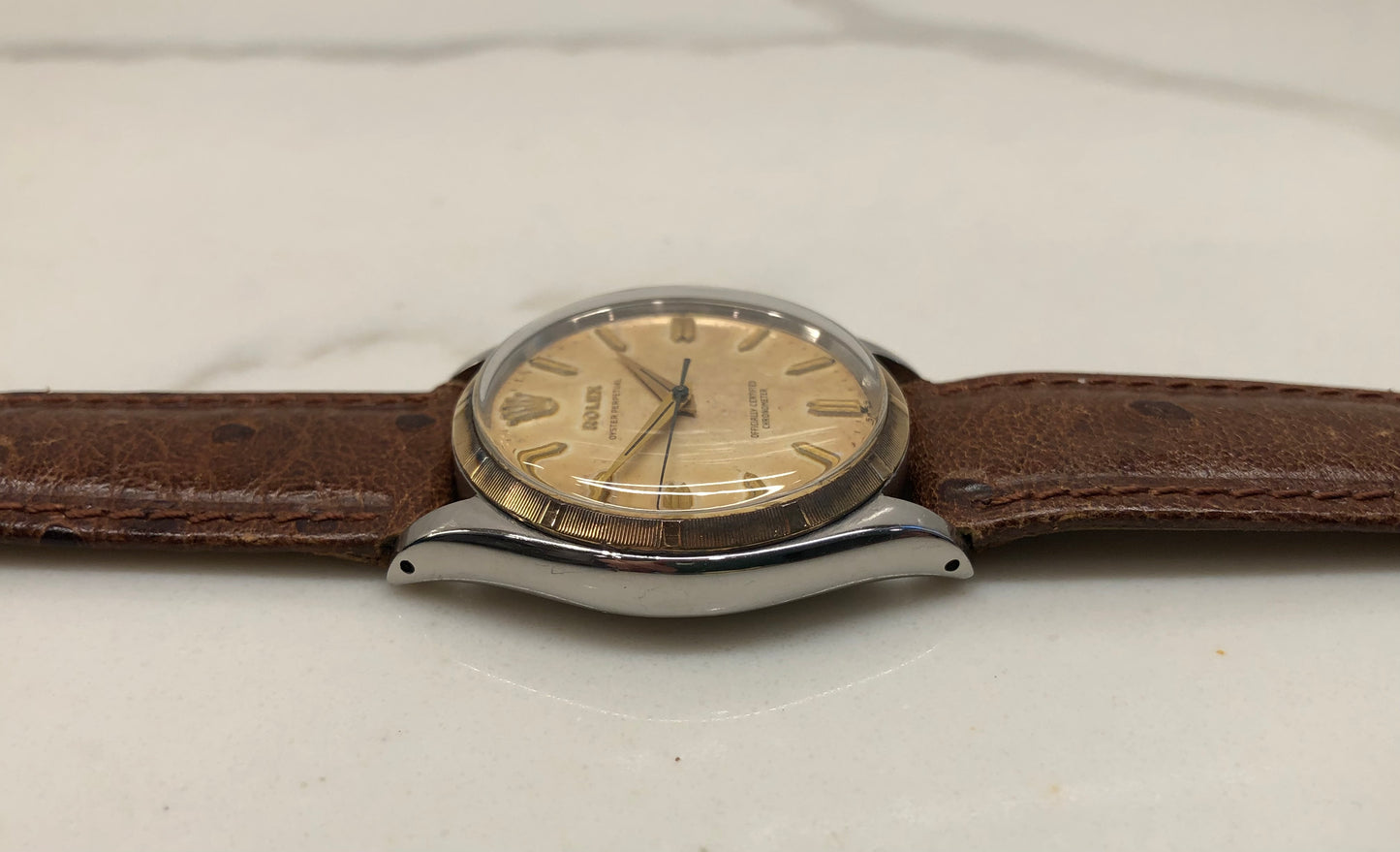 1957 Rolex Oyster Perpetual 6565 Two Tone Engine Turned Bezel Automatic Wristwatch
