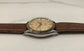 1957 Rolex Oyster Perpetual 6565 Two Tone Engine Turned Bezel Automatic Wristwatch