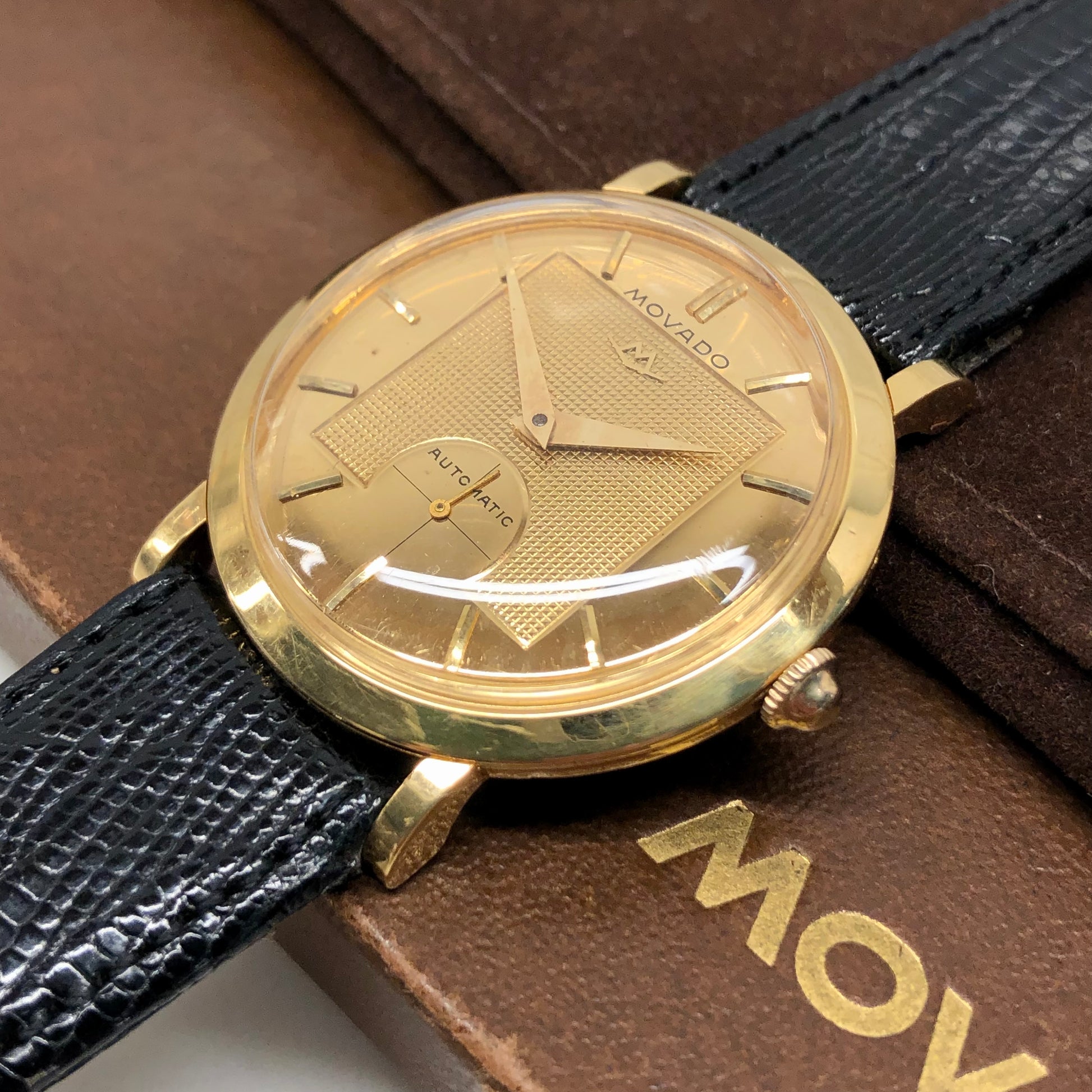 1960s Movado Gentleman Deluxe Mirror Hobnail 18K Yellow Gold Automatic Dress Wristwatch with Original Box and Booklet - Hashtag Watch Company