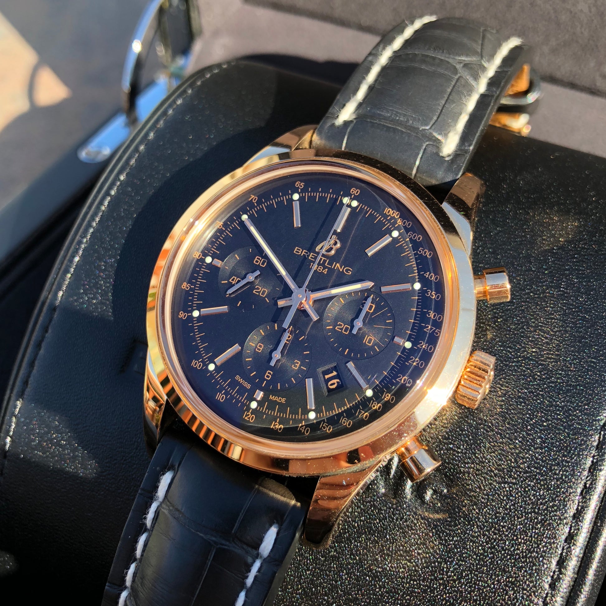 Breitling Transocean RB015212 18K Rose Gold Chronograph Black Dial