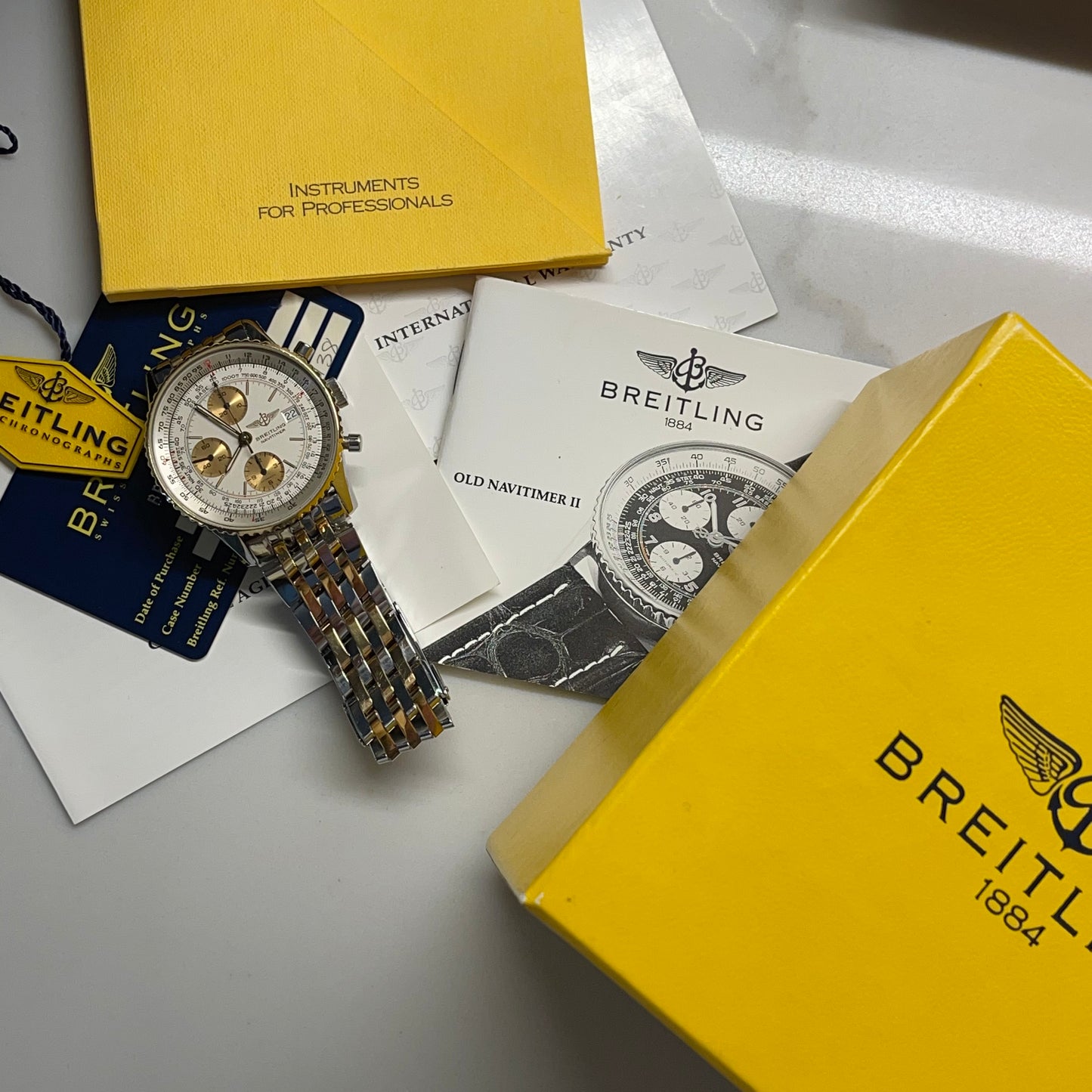 Breitling Old Navitimer II D13022 Two Tone Gold Steel Automatic Chronograph Box Papers - Hashtag Watch Company