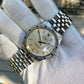 Vintage Rolex Date 15010 Steel Jubilee Cal. 3035 Engine Turn Wristwatch Circa 1985 - Hashtag Watch Company