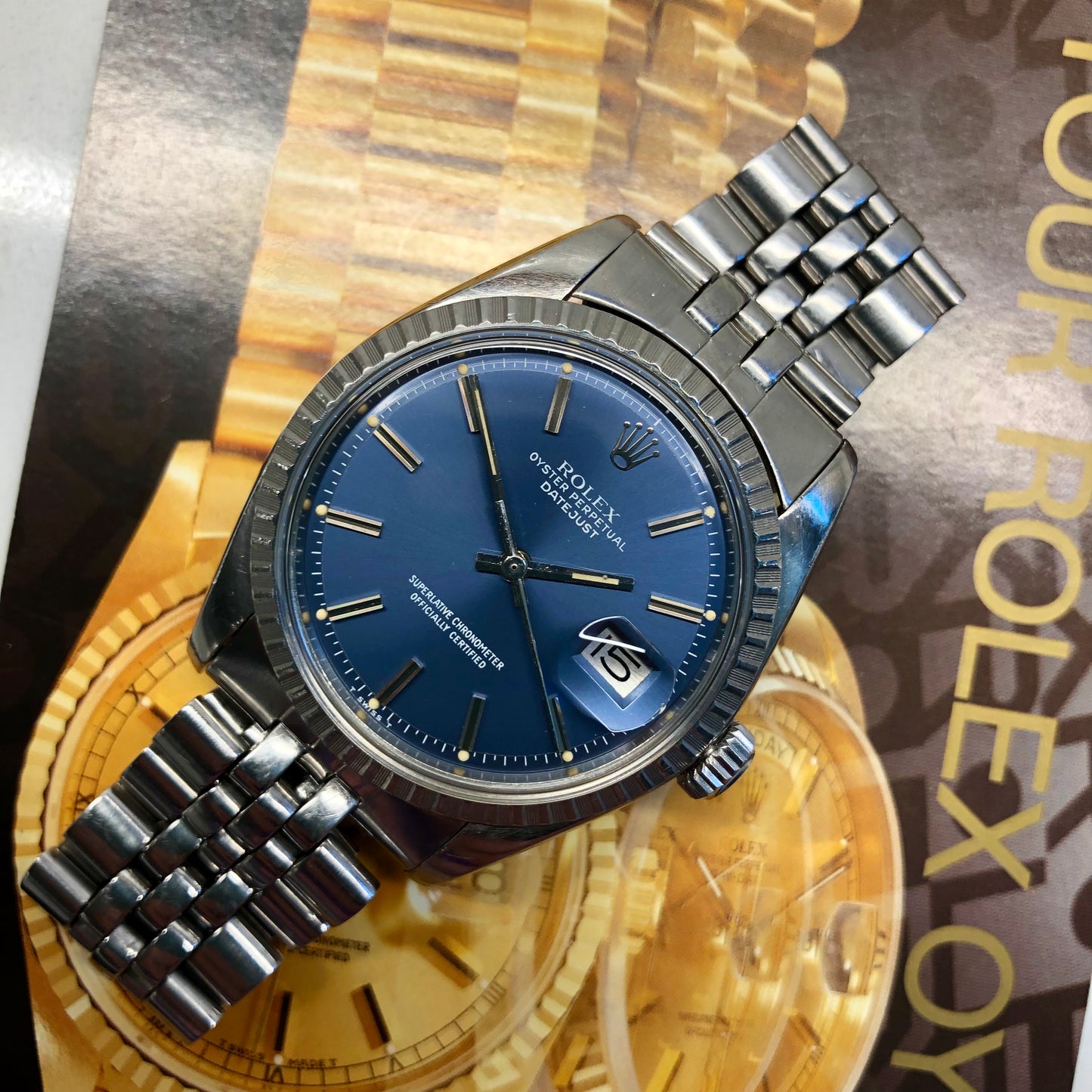 1977 Rolex Datejust 1603 Steel Engine Turned Jubilee Blue Dial Wristwatch - Hashtag Watch Company