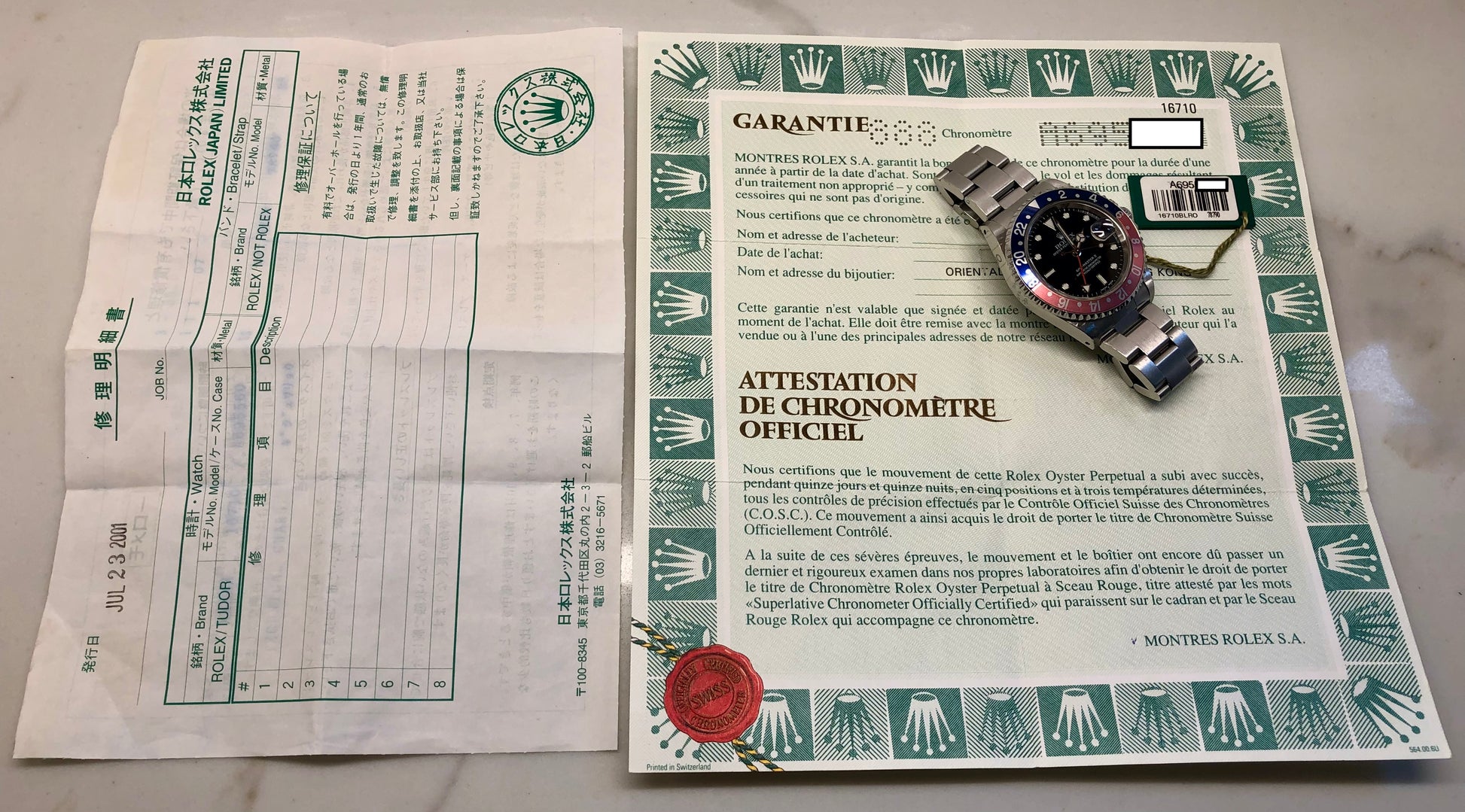 1999 Rolex GMT MASTER II 16710 Pepsi Oyster Wristwatch with Original Tag and Papers - Hashtag Watch Company