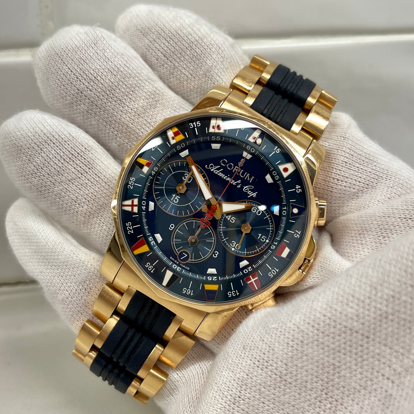 Corum Admiral's Cup Chronograph 44mm 18K Rose Gold Rubber Bracelet Blue Dial 985.673.55 - Hashtag Watch Company