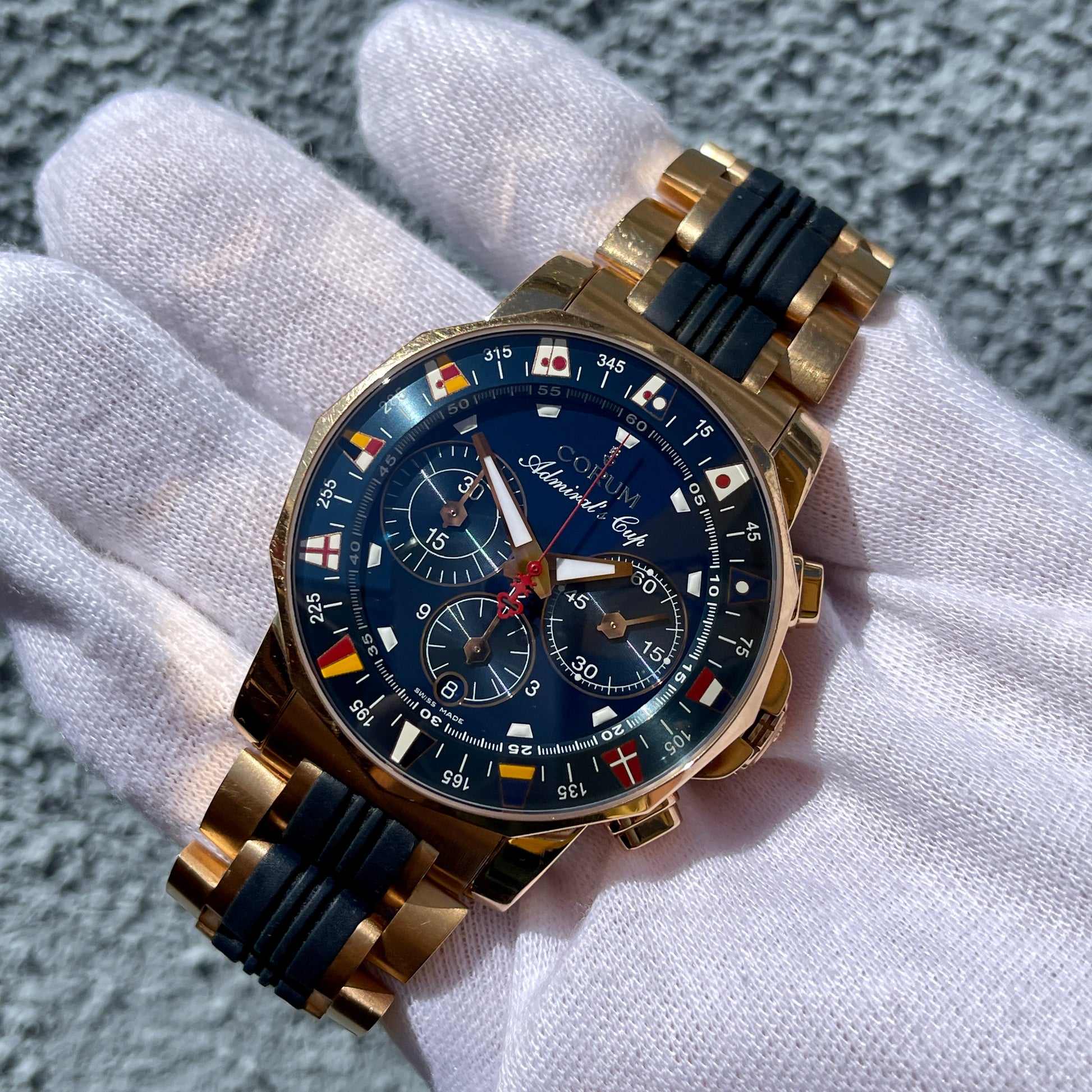 Corum Admiral's Cup Chronograph 44mm 18K Rose Gold Rubber Bracelet Blue Dial 985.673.55 - Hashtag Watch Company