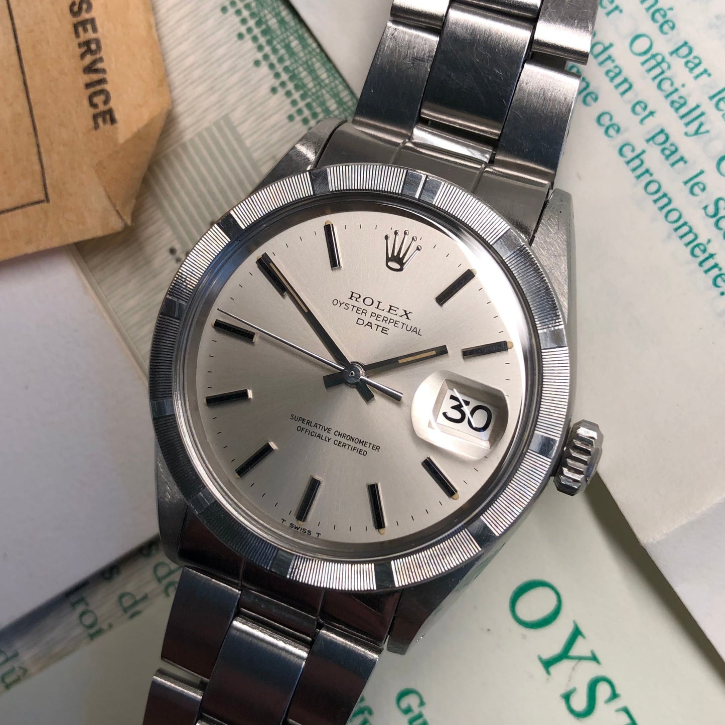 1970 Rolex Date 1501 Steel Engine Turned Oyster Silver Dial Wristwatch with PX Store Recepit and Punched Papers - Hashtag Watch Company